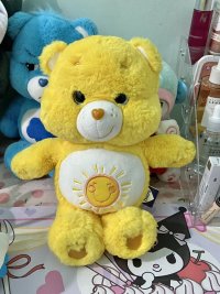gấu carebear vàng.jpg