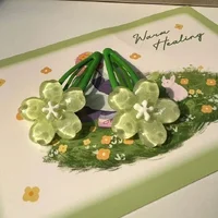kẹp tóc hoa xanh.webp
